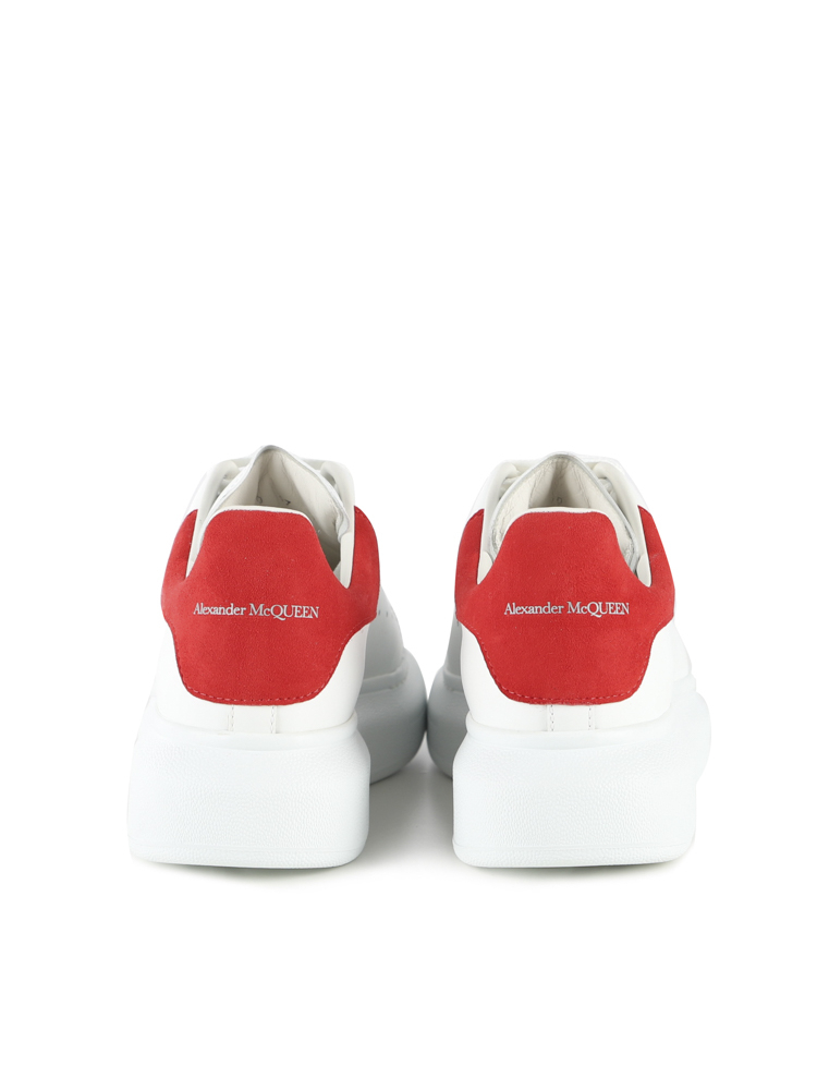 ALEXANDER MCQUEEN - SNEAKERS OVERSIZE IN PELLE CON TALLONCINO A CONTRASTO