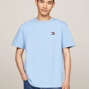 DM0DM17995_C15_main TOMMY HILFIGER - T-shirt con distintivo Tommy sul petto - Blu Chiaro
