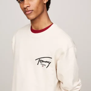 DM0DM19230_ACG_alternate2 TOMMY HILFIGER - Felpa con logo firma grafico sul retro
