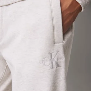 CALVIN KLEIN - Pantaloncini da tuta in felpa con monogramma