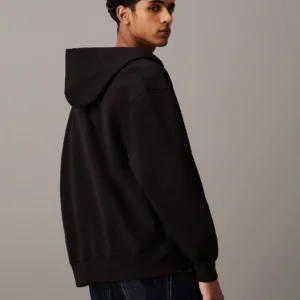 CALVIN KLEIN - Felpa con cappuccio e zip integrale dal taglio relaxed - Nero