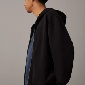 CALVIN KLEIN - Felpa con cappuccio e zip integrale dal taglio relaxed - Nero