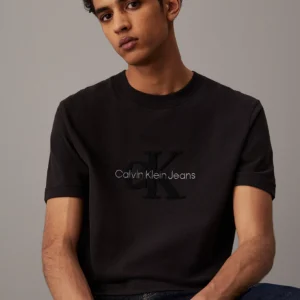 CALVIN KLEIN - T-shirt con monogramma logo in ciniglia - Nero