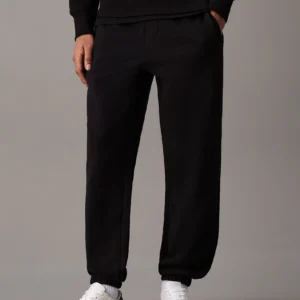 CALVIN KLEIN - Pantaloni da tuta dritti in felpa pesante - Nero